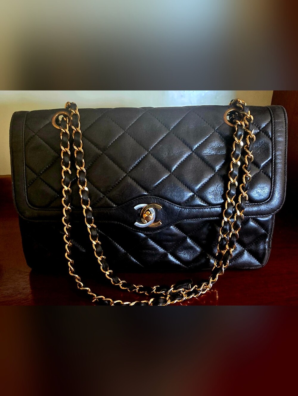CHANEL Black Quilted Leather Shoulder Bag with Gold Hardware